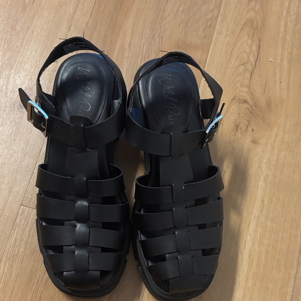 Well Worn Black Sandals